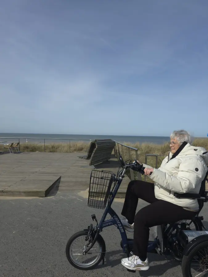 Lady on a Van Raam Easy Rider at Bicycles in Egmond aan zee